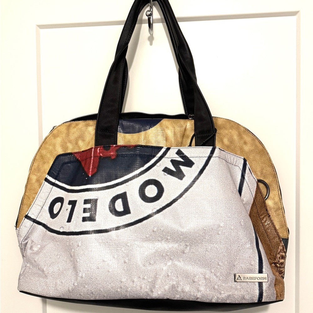 RAREFORM Modelo Maya Crossbody Bag up cycled billboard bag a unique eco friendly